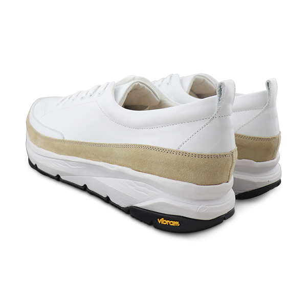 White sneakers with suede insert