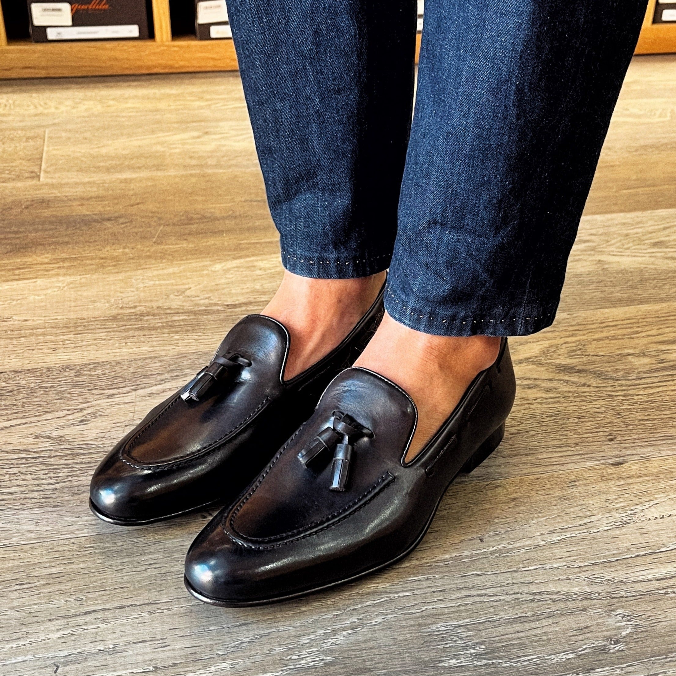 Black leather slippers