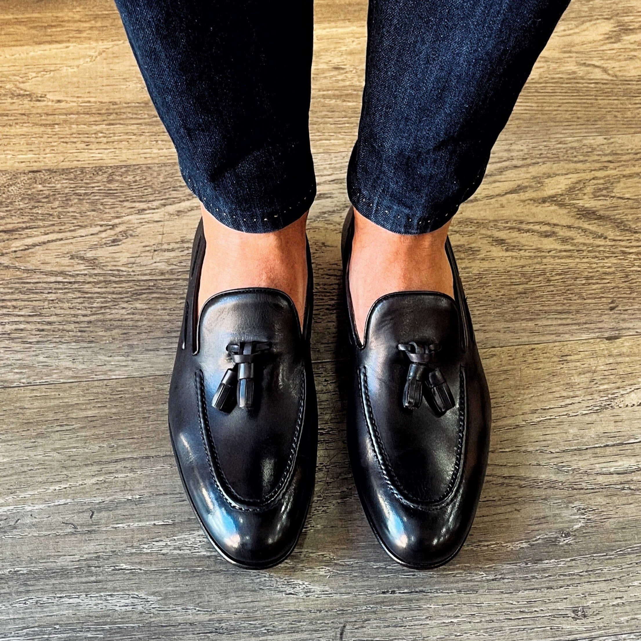 Black leather slippers