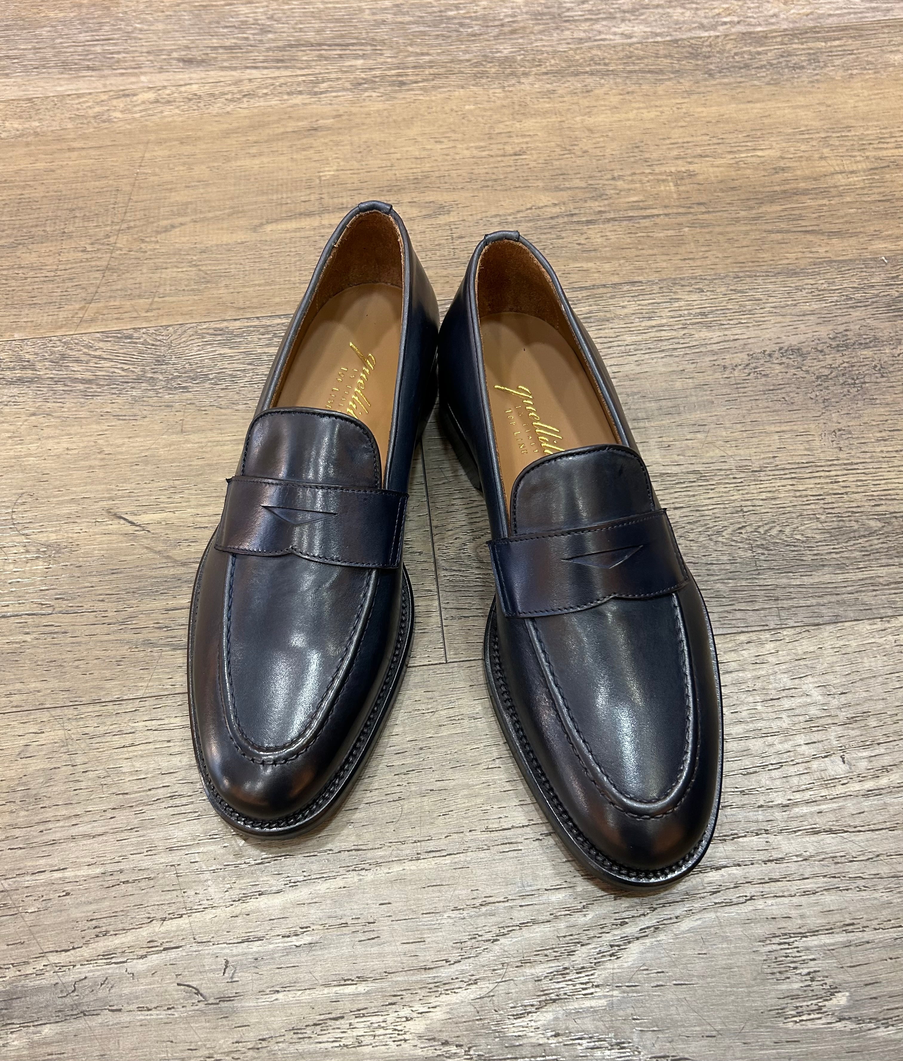 Blue leather moccasins