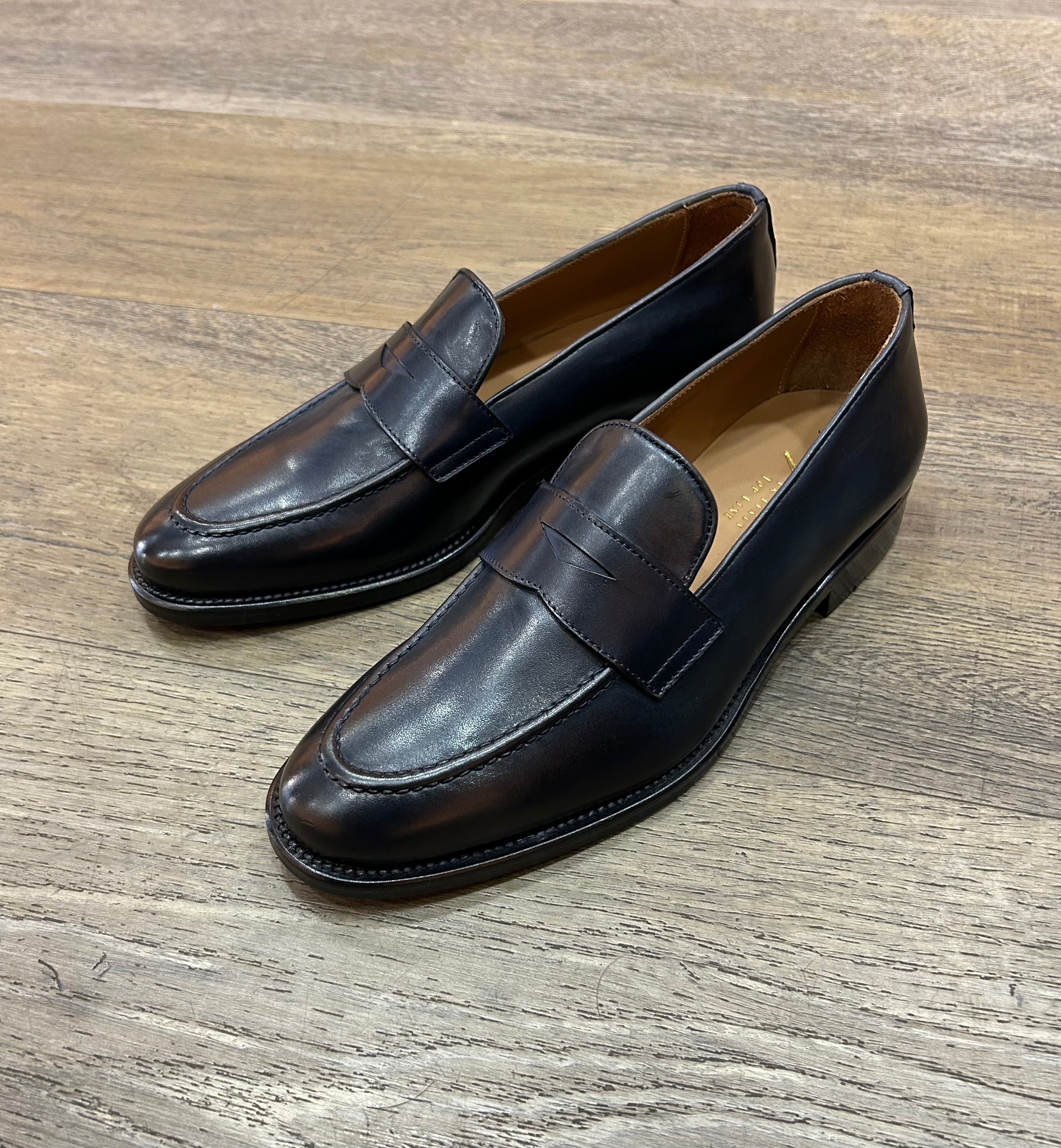 Blue leather moccasins