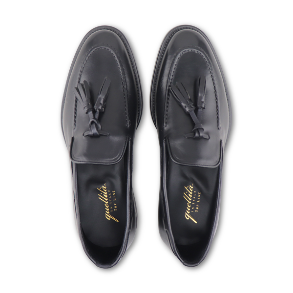 Black leather slippers