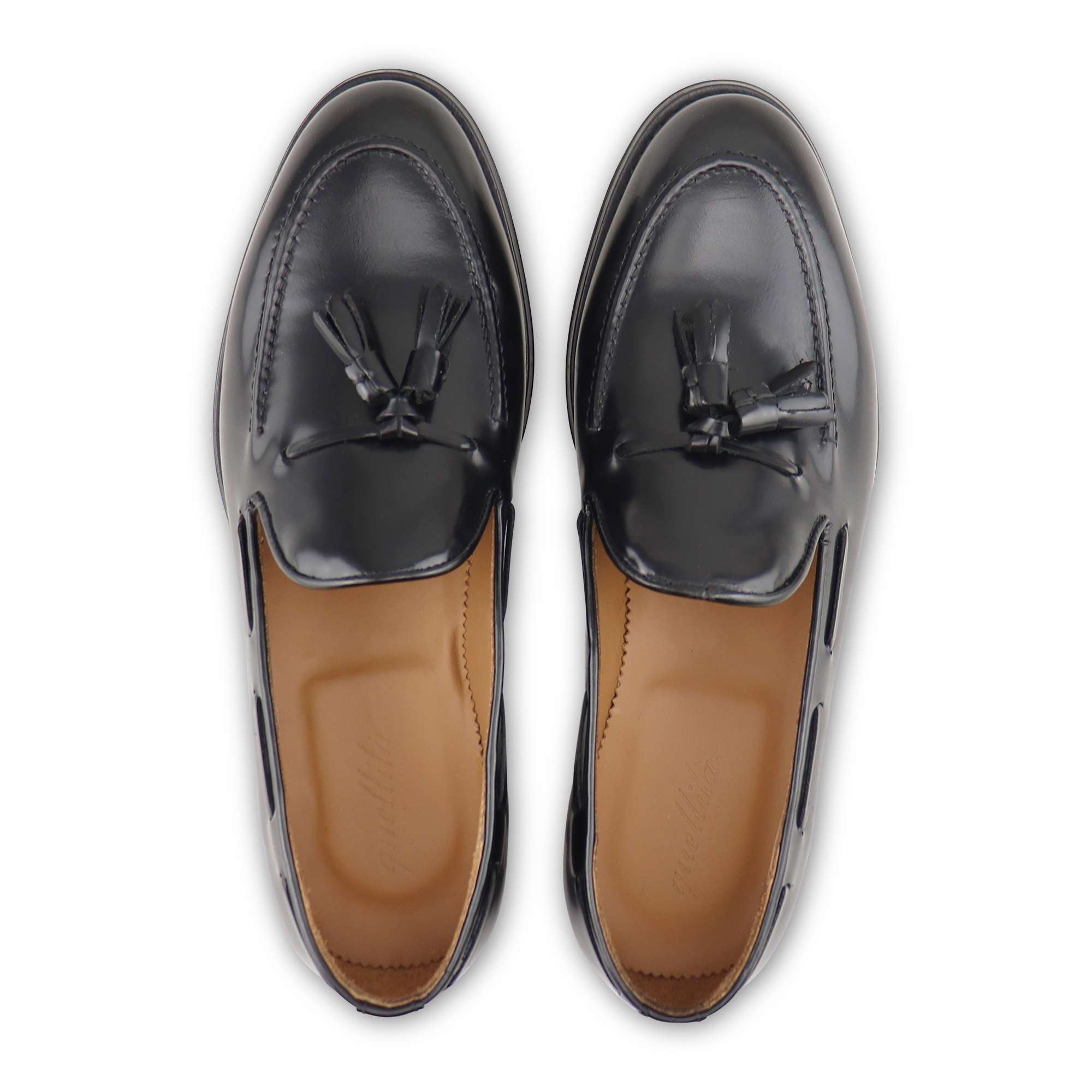 Black tassel in abrasive leather