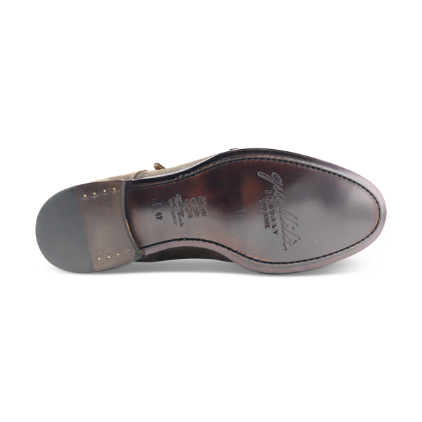 Scarpe con doppia fibbia con suola in cuoio cucita