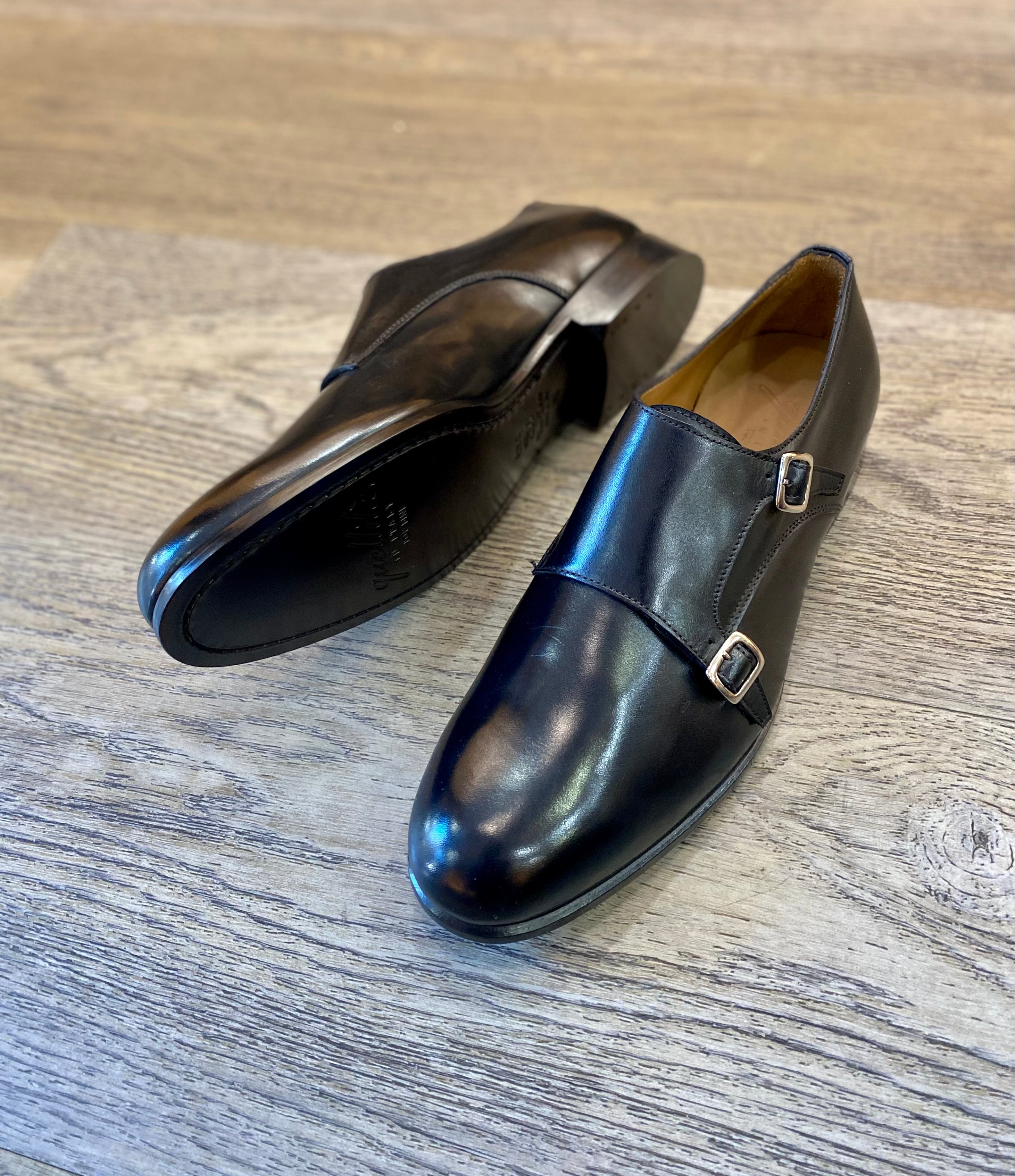 Scarpe con doppia fibbia nere in pelle