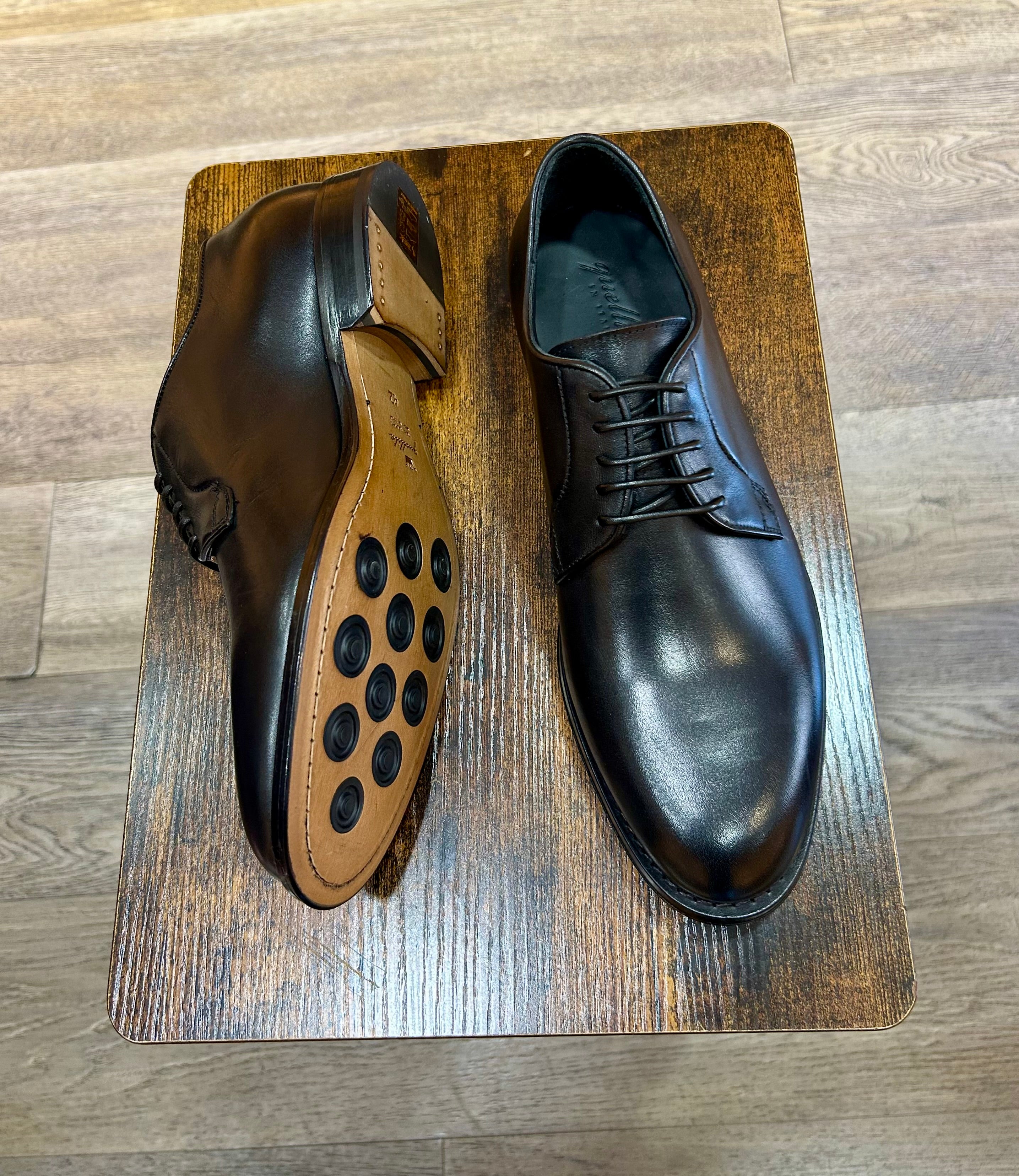 Black leather derby