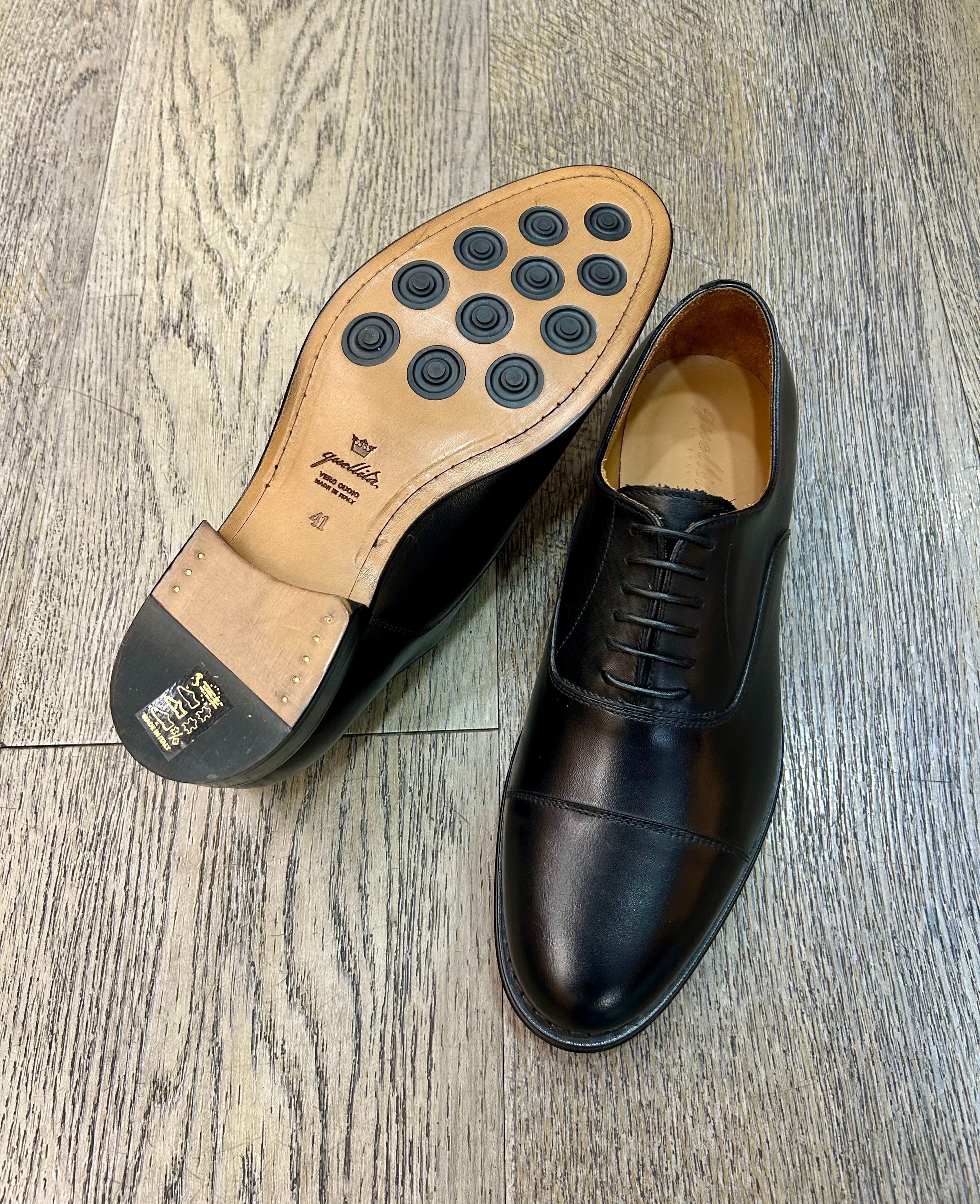 Black leather brogue
