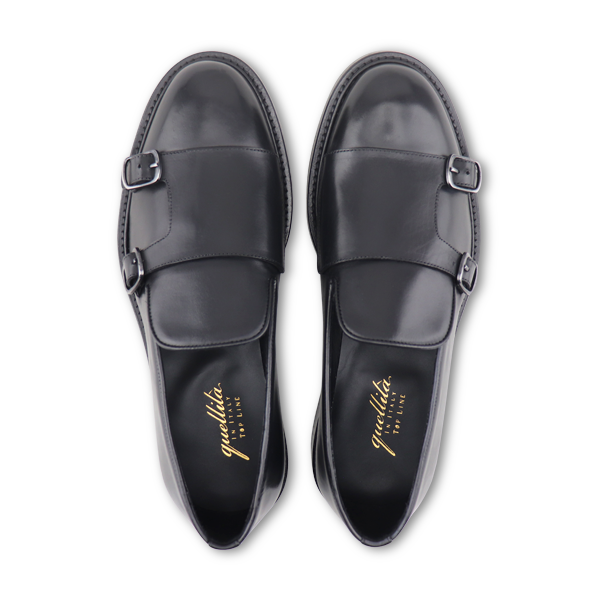 Slippers con fibbie in pelle nero