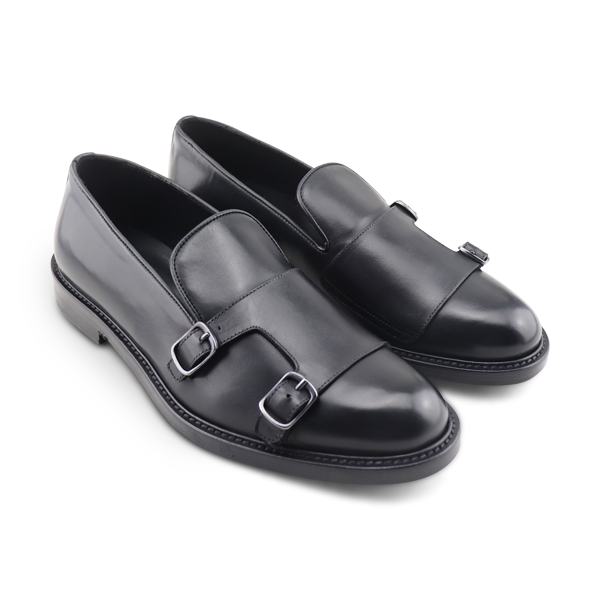 Slippers con fibbie in pelle nero