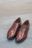 Brandy-colored leather Oxfords shoes