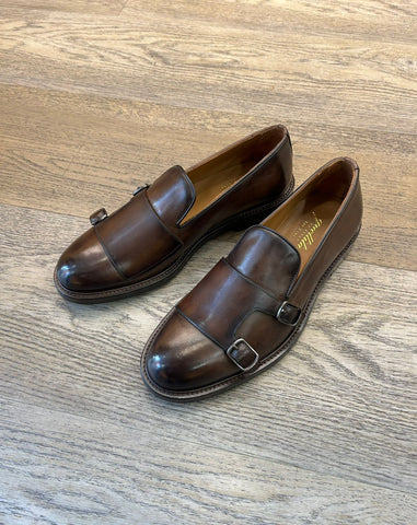Slippers con fibbie testa di moro in pelle