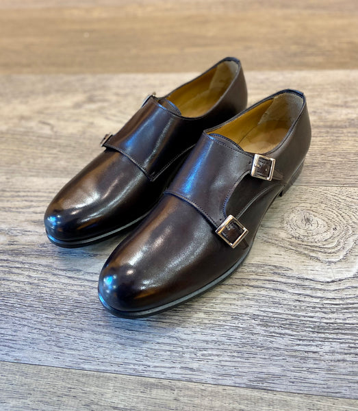 Scarpe con doppia fibbia in pelle testa di moro