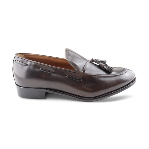 Slipper in pelle con nappine
